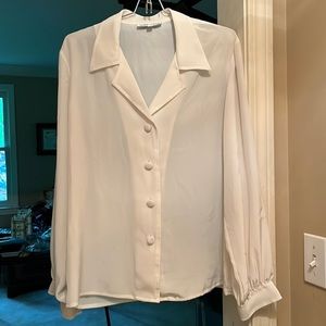 Very thin almost sheer very light cream (almost white ) shirt